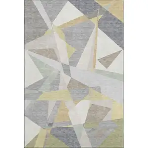 Photo of Pewter Ivory And Wheat Geometric Washable Area Rug With UV Protection