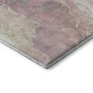 Photo of Pink And Beige Abstract Washable Area Rug With UV Protection