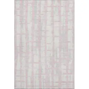 Photo of Pink And Beige Striped Washable Area Rug With UV Protection