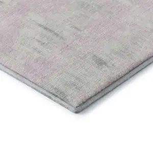 Photo of Pink And Beige Striped Washable Area Rug With UV Protection