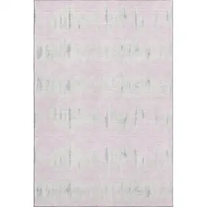 Photo of Pink And Beige Striped Washable Area Rug With UV Protection
