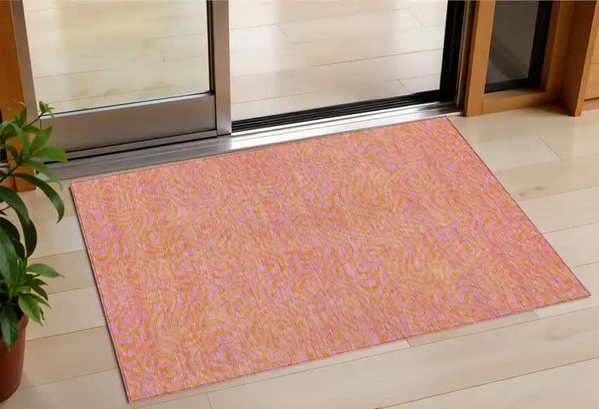 Pink And Copper Abstract Washable Indoor Outdoor Area Rug Photo 1