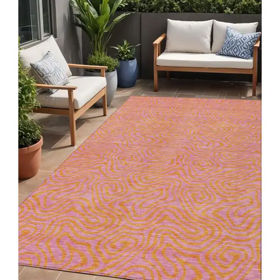 Pink And Copper Abstract Washable Indoor Outdoor Area Rug Photo 1