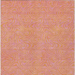 Photo of Pink And Copper Abstract Washable Indoor Outdoor Area Rug