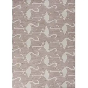 Photo of Pink And Cream Animal Print Indoor Outdoor Area Rug