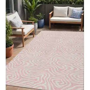 Photo of Pink And Gray Abstract Washable Indoor Outdoor Area Rug