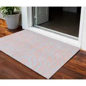 Photo of Pink And Gray Animal Print Washable Indoor Outdoor Area Rug