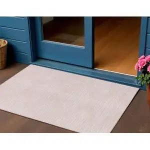 Photo of Pink And Gray Geometric Washable Indoor Outdoor Area Rug