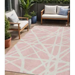 Photo of Pink And Gray Geometric Washable Indoor Outdoor Area Rug