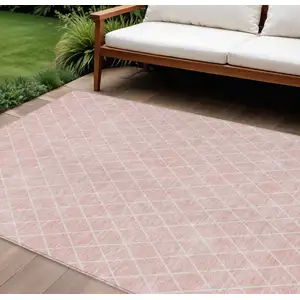 Photo of Pink And Gray Geometric Washable Indoor Outdoor Area Rug