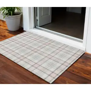 Photo of Pink And Gray Plaid Washable Indoor Outdoor Area Rug
