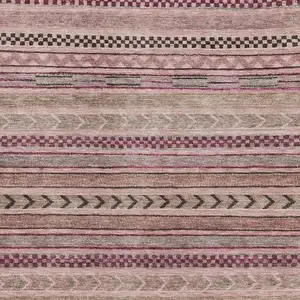 Photo of Pink And Gray Striped Washable Area Rug With UV Protection