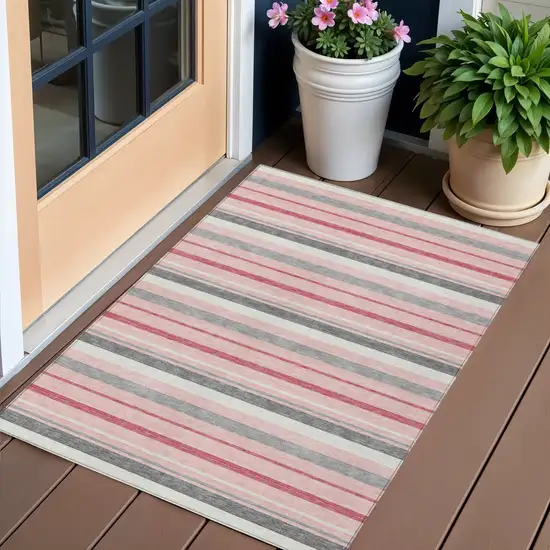 Pink And Gray Striped Washable Indoor Outdoor Area Rug Photo 1