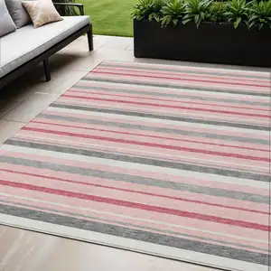 Photo of Pink And Gray Striped Washable Indoor Outdoor Area Rug