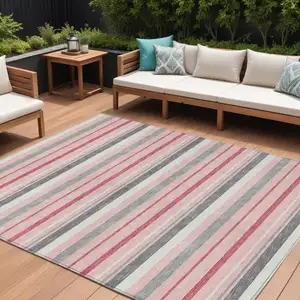 Photo of Pink And Gray Striped Washable Indoor Outdoor Area Rug