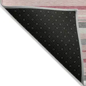 Photo of Pink And Gray Striped Washable Indoor Outdoor Area Rug