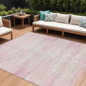 Photo of Pink And Gray Striped Washable Indoor Outdoor Area Rug