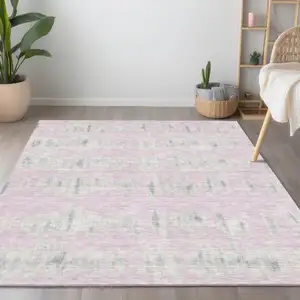 Photo of Pink And Gray Striped Washable Indoor Outdoor Area Rug