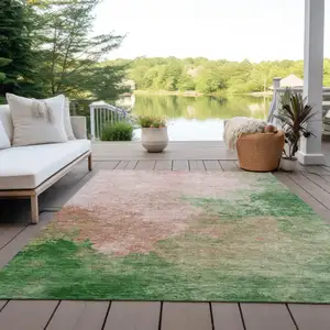 Photo of Pink And Green Abstract Washable Indoor Outdoor Area Rug