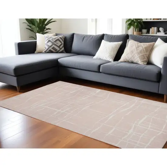 Pink And Ivory Abstract Distressed Area Rug Photo 1