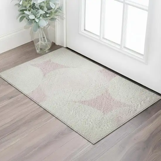 Pink And Ivory Abstract Geometric Washable Area Rug With UV Protection Photo 2