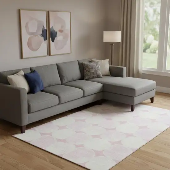 Pink And Ivory Abstract Geometric Washable Area Rug With UV Protection Photo 1