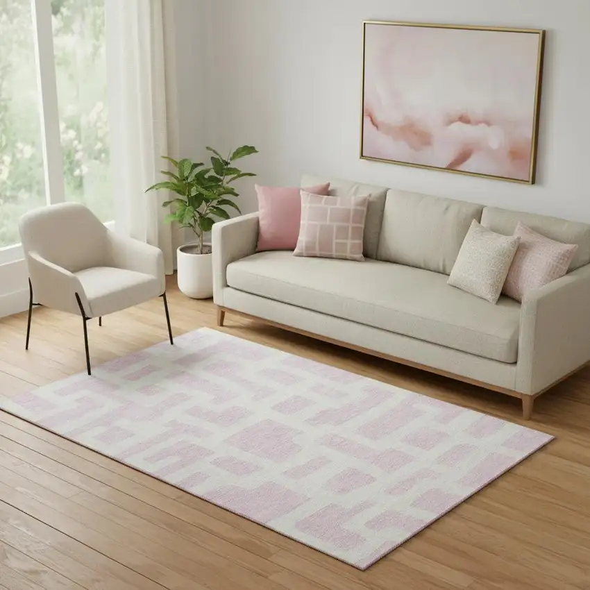 Pink And Ivory Abstract Geometric Washable Area Rug With UV Protection Photo 1