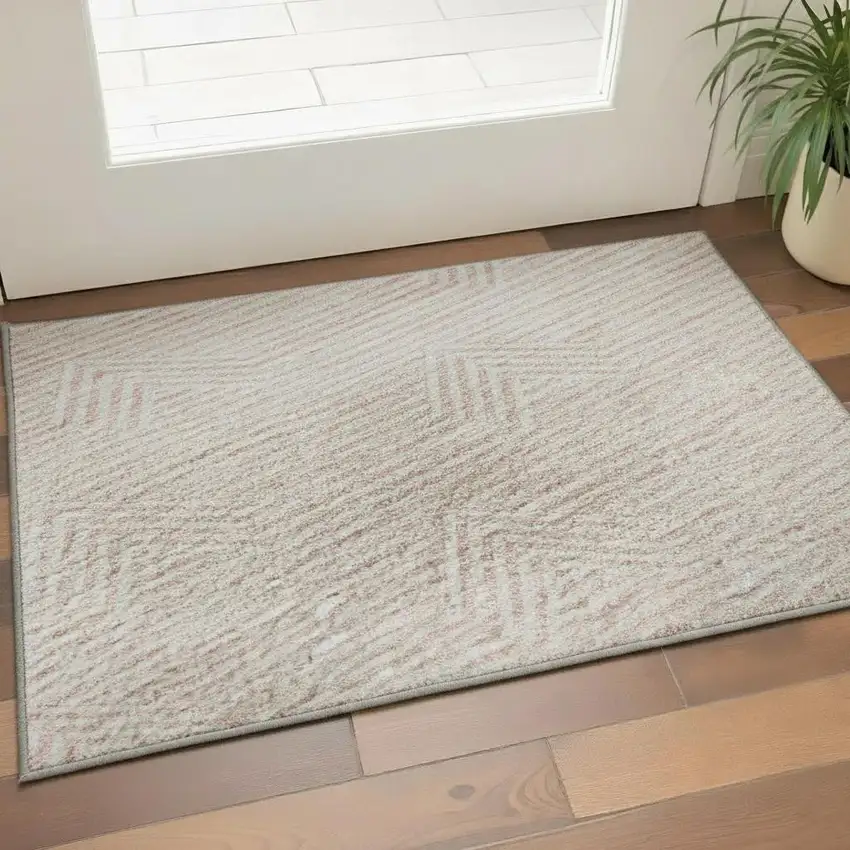 Pink And Ivory Abstract Geometric Washable Area Rug With UV Protection Photo 2