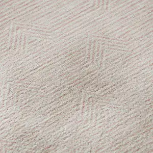 Photo of Pink And Ivory Abstract Geometric Washable Area Rug With UV Protection