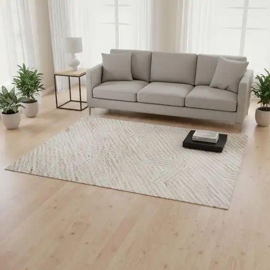 Pink And Ivory Abstract Geometric Washable Area Rug With UV Protection Photo 2