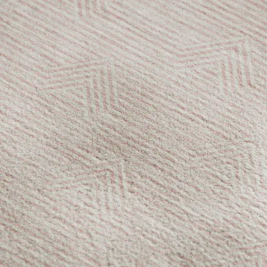 Pink And Ivory Abstract Geometric Washable Area Rug With UV Protection Photo 4