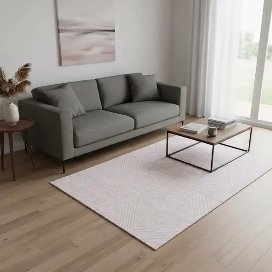 Pink And Ivory Abstract Geometric Washable Area Rug With UV Protection Photo 2