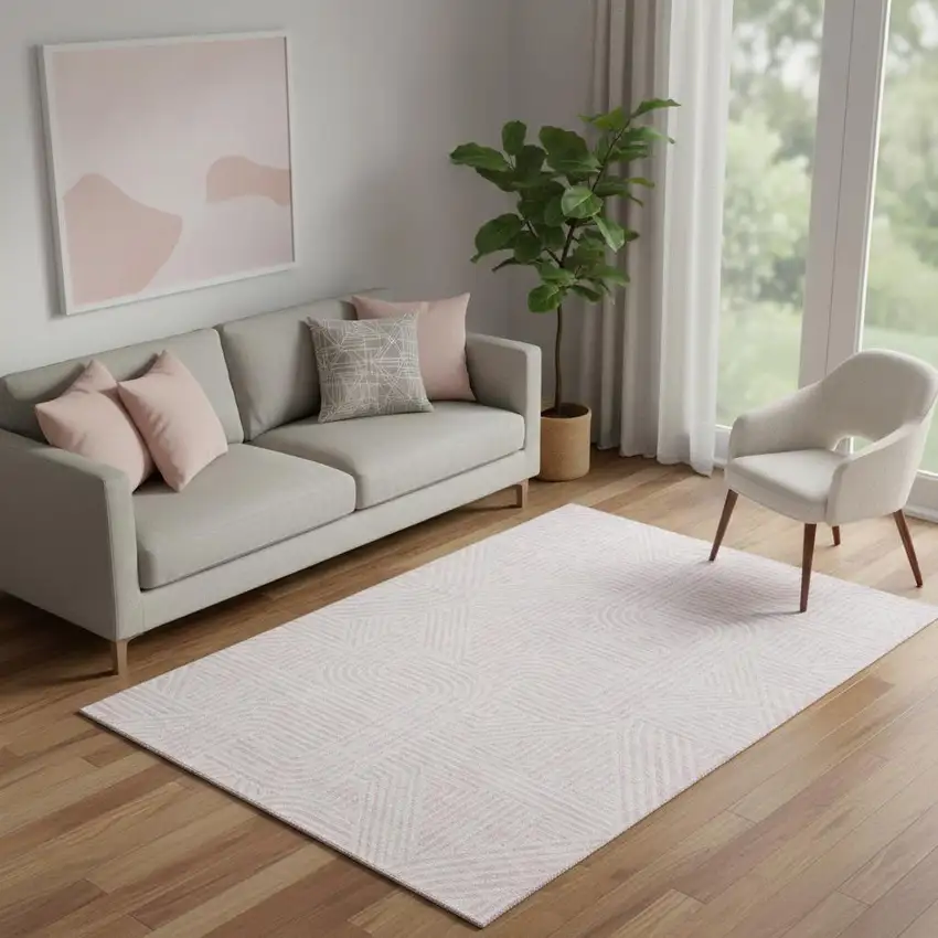 Pink And Ivory Abstract Geometric Washable Area Rug With UV Protection Photo 1