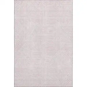 Photo of Pink And Ivory Abstract Geometric Washable Area Rug With UV Protection