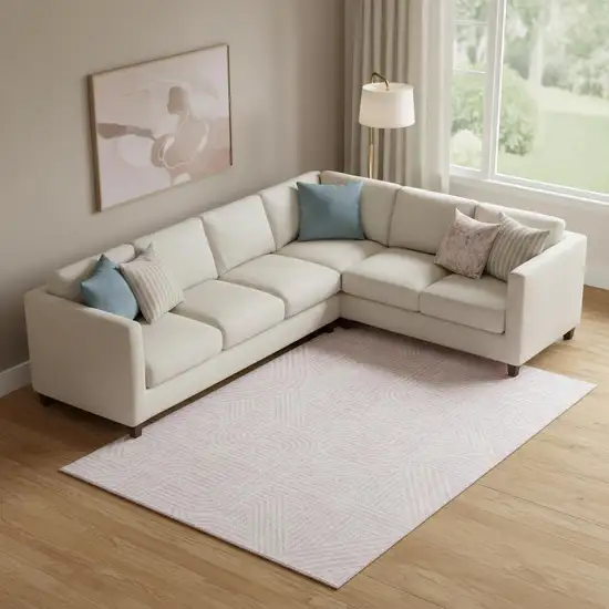 Pink And Ivory Abstract Geometric Washable Area Rug With UV Protection Photo 1