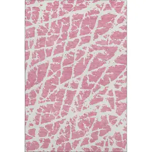 Photo of Pink And Ivory Abstract Washable Area Rug With UV Protection