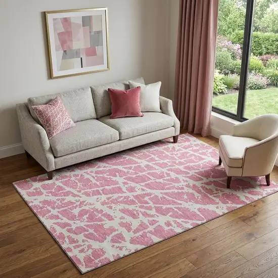 Pink And Ivory Abstract Washable Area Rug With UV Protection Photo 1