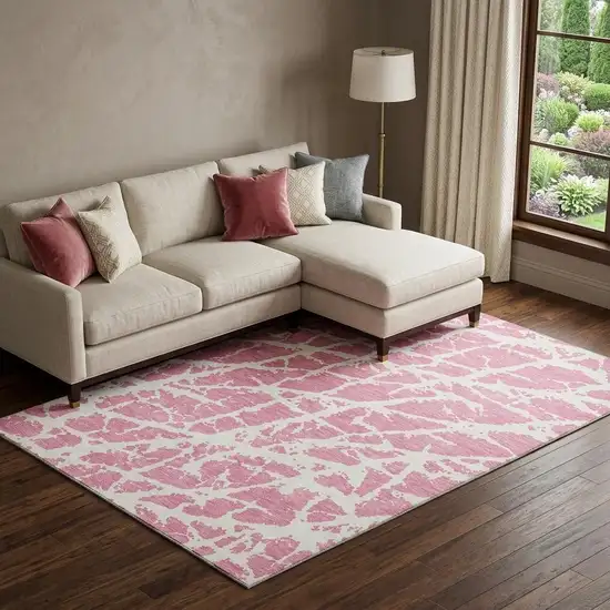 Pink And Ivory Abstract Washable Area Rug With UV Protection Photo 1