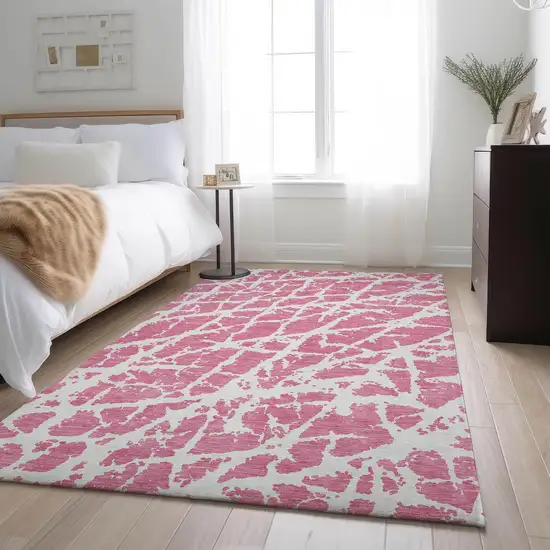 Pink And Ivory Abstract Washable Area Rug With UV Protection Photo 4