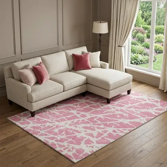 Pink And Ivory Abstract Washable Area Rug With UV Protection Photo 1