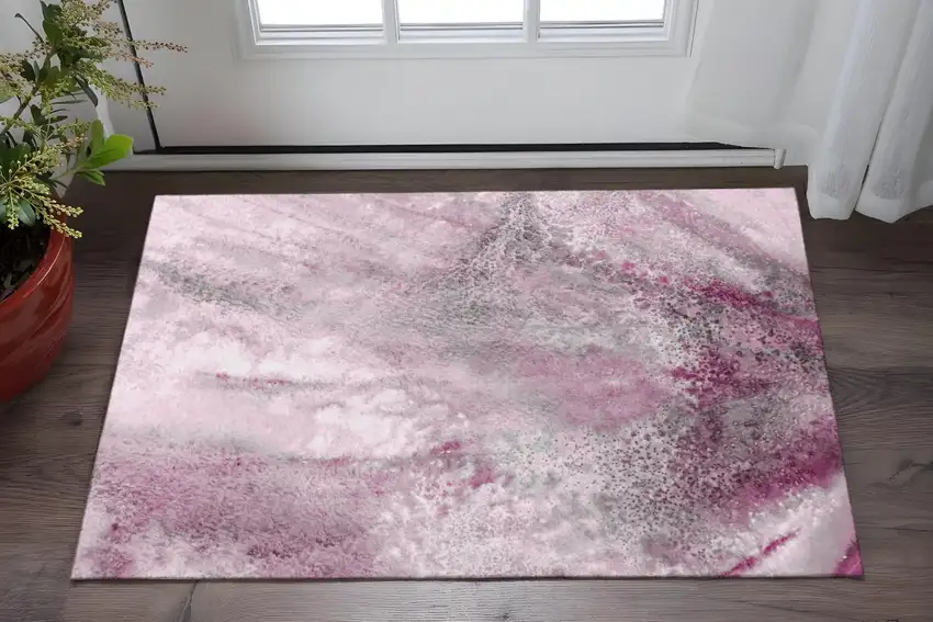 Pink And Ivory Abstract Washable Area Rug With UV Protection Photo 2