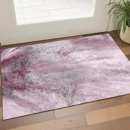 Pink And Ivory Abstract Washable Area Rug With UV Protection Photo 1