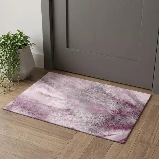 Pink And Ivory Abstract Washable Area Rug With UV Protection Photo 1