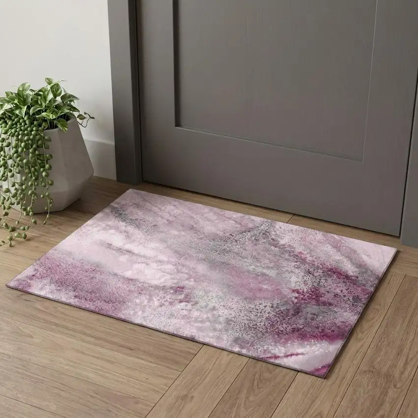 Pink And Ivory Abstract Washable Area Rug With UV Protection Photo 1