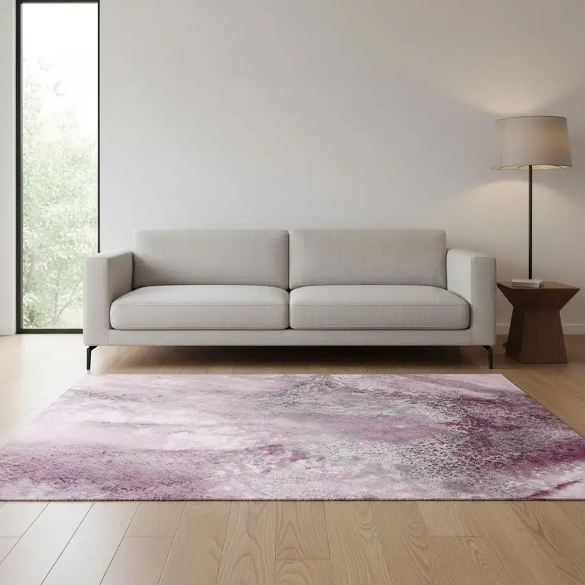 Pink And Ivory Abstract Washable Area Rug With UV Protection Photo 1