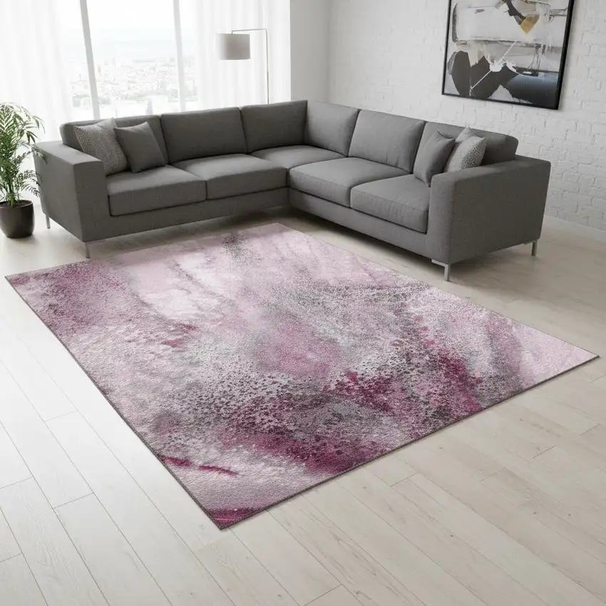 Pink And Ivory Abstract Washable Area Rug With UV Protection Photo 1