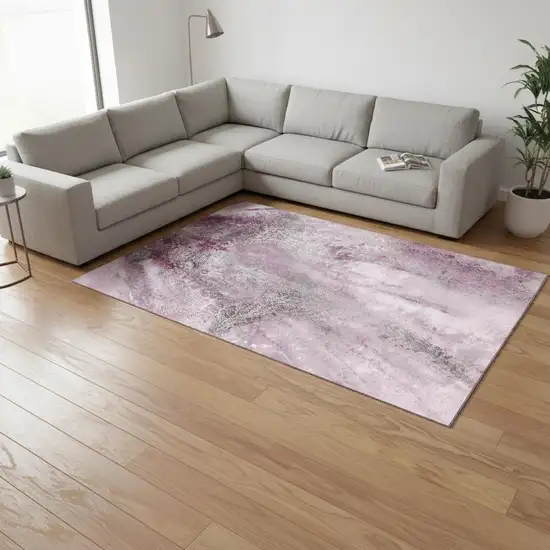 Pink And Ivory Abstract Washable Area Rug With UV Protection Photo 1