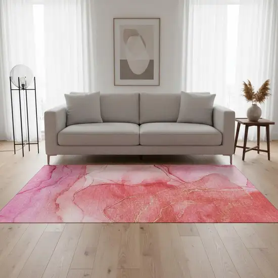 Pink And Ivory Abstract Washable Area Rug With UV Protection Photo 1