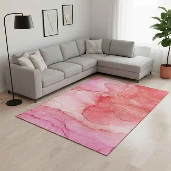 Pink And Ivory Abstract Washable Area Rug With UV Protection Photo 1