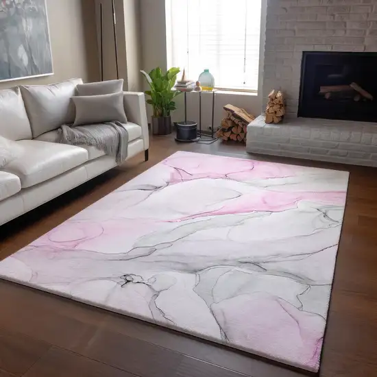 Pink And Ivory Abstract Washable Area Rug With UV Protection Photo 8